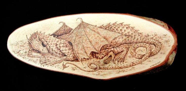 Sleeping Dragon by Sue Burne
I am a glass engraver and pyrographer and I'm attaching just two of my works. They are my own original designs.

