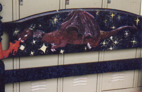 By Princess`of`Darkness
This is a picture of a dragon i painted on a bed frame for a school art project.. i'm a high school senior and did the dragon myself.. it took 4-5 weeks to complete.
