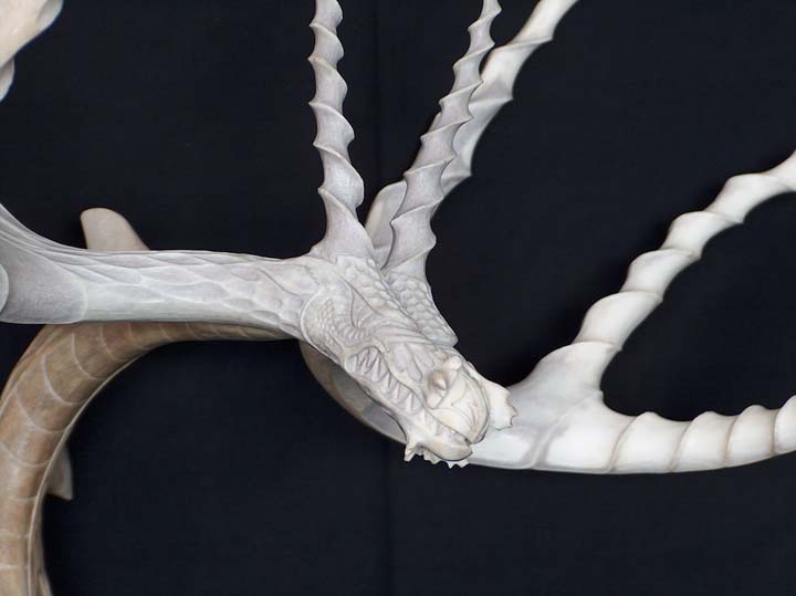 We have an on line Aboriginal art gallery, one of our artists dose antler carving and has created a fantastic dragon made from 5 deer antlers 2 being a match set that are bolted together. This dragon Stands 28 inches to the highest tip to 22 inches across. This is the second of two that have been created, this one is for sale the asking price is 3,500.00. I thought you being a dragon enthusiast you may know of someone interested in purchasing this on. 
