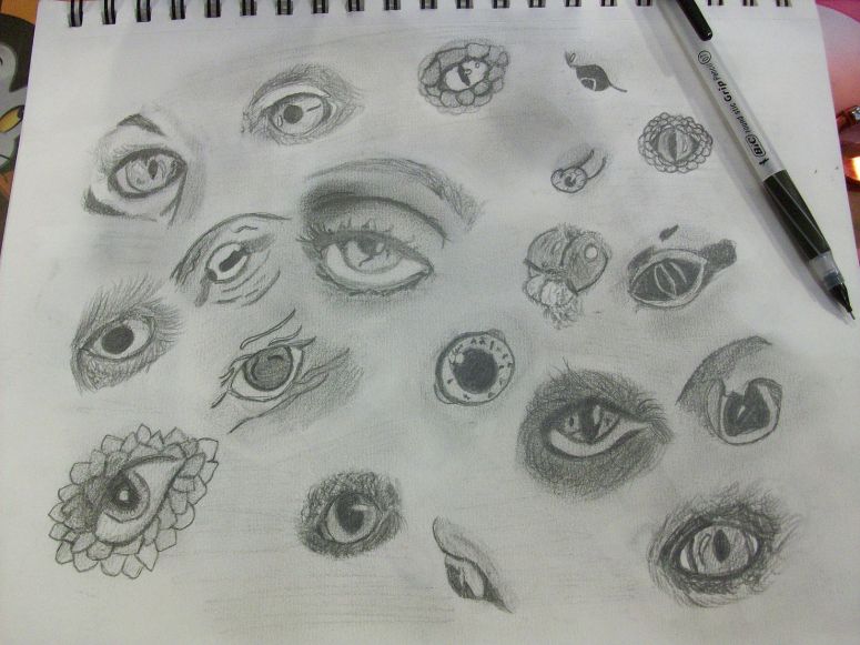 Eyes of the World - By CatC
05/2010
I am trying to get back into the traditional drawing swing and this was my attempt :) The eyes of different creatures. the eye in the lower left corner is a dragons eye :) now going for the top left and around there is a tiger, eagle, snake, frog, lizard, geeko, cuttlefish, lemur, cat, amphibian, fish, dog, the dragon eye, owl and then going into the second row going around there is the octopus, a person, snail. fly, (the fish as mentioned before), and a shark.  So yeah hope you all like it
Keywords: eye